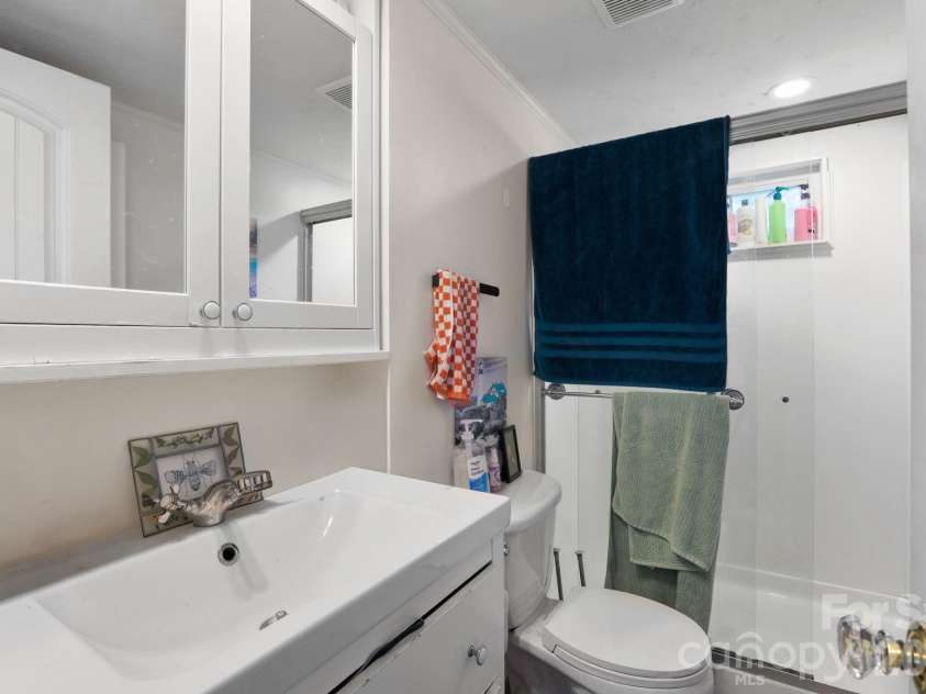 169 and 171 Cragmont Road, Black Mountain, NC 28711.  MLS# CAR4416488, YatesRealty ID 46103. Cottage bathroom