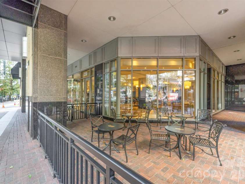 230 Tryon Street, Charlotte, NC 28202.  MLS# CAR4321048, YatesRealty ID 4611. Corner view of lobby