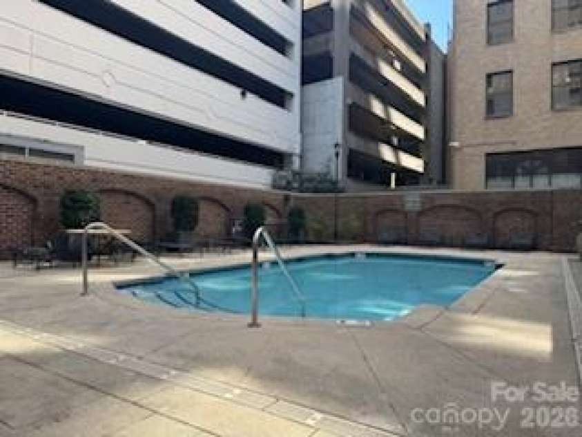 230 Tryon Street, Charlotte, NC 28202.  MLS# CAR4321048, YatesRealty ID 4611. Fenced in Pool Area