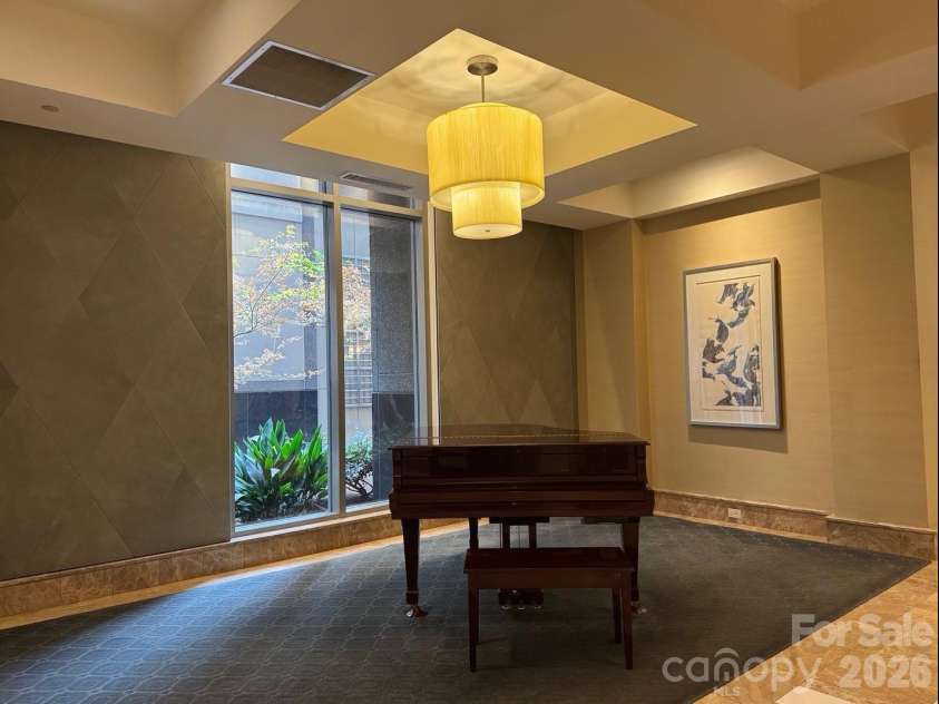 230 Tryon Street, Charlotte, NC 28202.  MLS# CAR4321048, YatesRealty ID 4611. Lobby going back towards the elevator