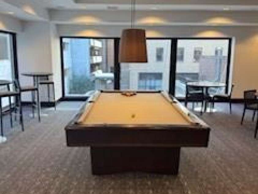 230 Tryon Street, Charlotte, NC 28202.  MLS# CAR4321048, YatesRealty ID 4611. Pool Table in Club House