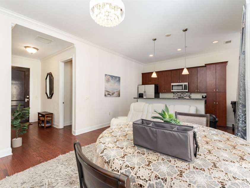 230 Tryon Street, Charlotte, NC 28202.  MLS# CAR4321048, YatesRealty ID 4611. View of Kitchen from the Living Room