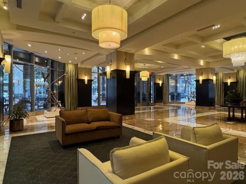 230 Tryon Street, Charlotte, NC 28202.  MLS# CAR4321048, YatesRealty ID 4611. View of Lobby from other side