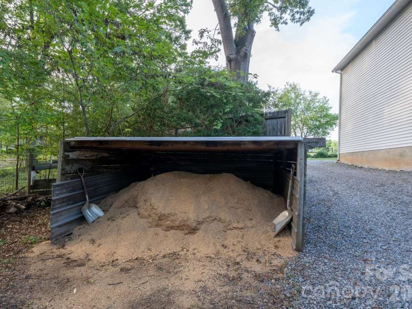 4904 Willow Pond Road, Clover, SC 29710.  MLS# CAR4412083, YatesRealty ID 46114. Covered shavings storage