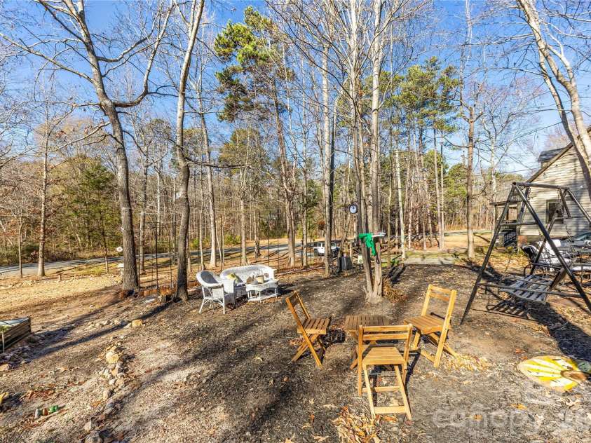 16218 Barbee Road, Stanfield, NC 28163.  MLS# CAR4308788, YatesRealty ID 46116. LIGHTED OUTDOOR SITTING AREA