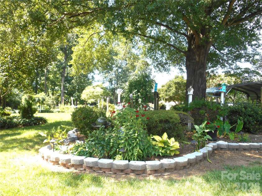 830 Salem Church Road, Lincolnton, NC 28092.  MLS# CAR4416779, YatesRealty ID 46118. Backyard Gardens