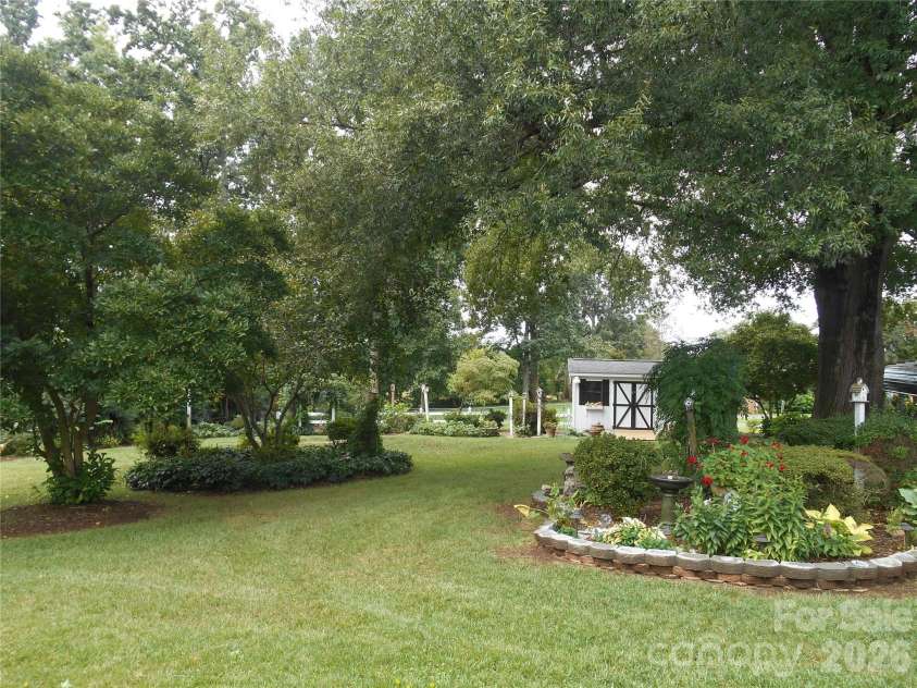 830 Salem Church Road, Lincolnton, NC 28092.  MLS# CAR4416779, YatesRealty ID 46118. Backyard with Workshop