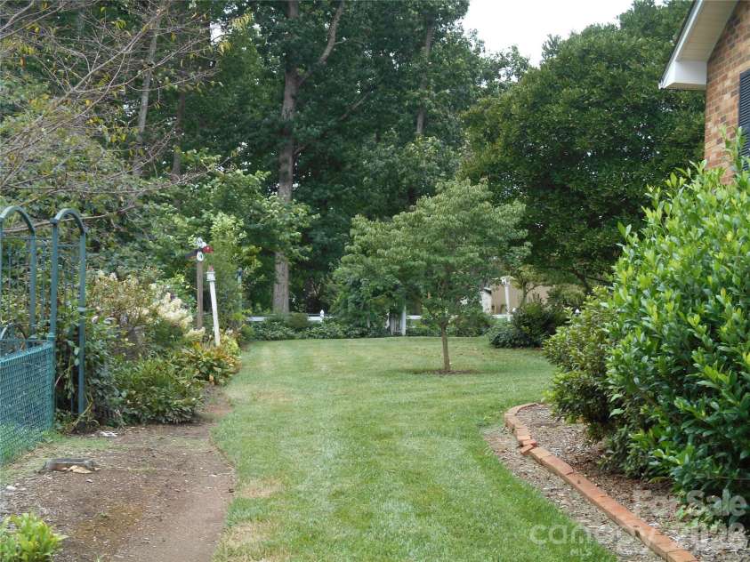 830 Salem Church Road, Lincolnton, NC 28092.  MLS# CAR4416779, YatesRealty ID 46118. Side Yard