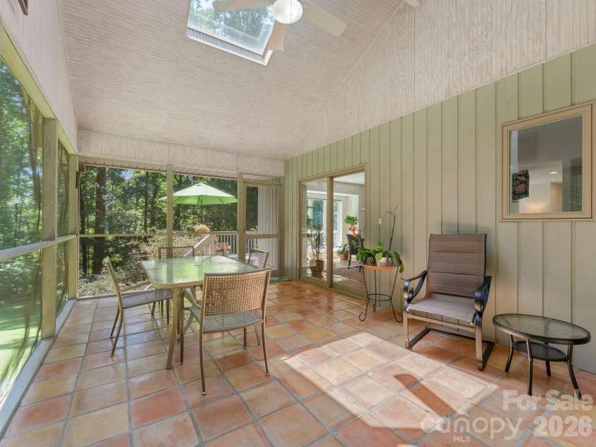 5 Jackson Grove, Landrum, SC 29356.  MLS# CAR4416972, YatesRealty ID 46122. Large Screened Porch with access from the kitchen.