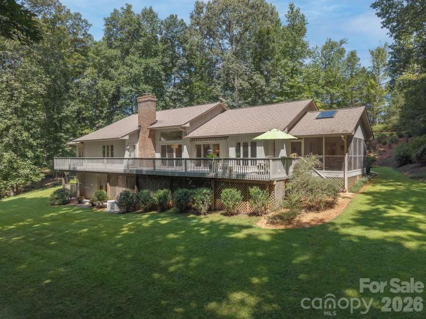 5 Jackson Grove, Landrum, SC 29356.  MLS# CAR4416972, YatesRealty ID 46122. Lovely back yard.