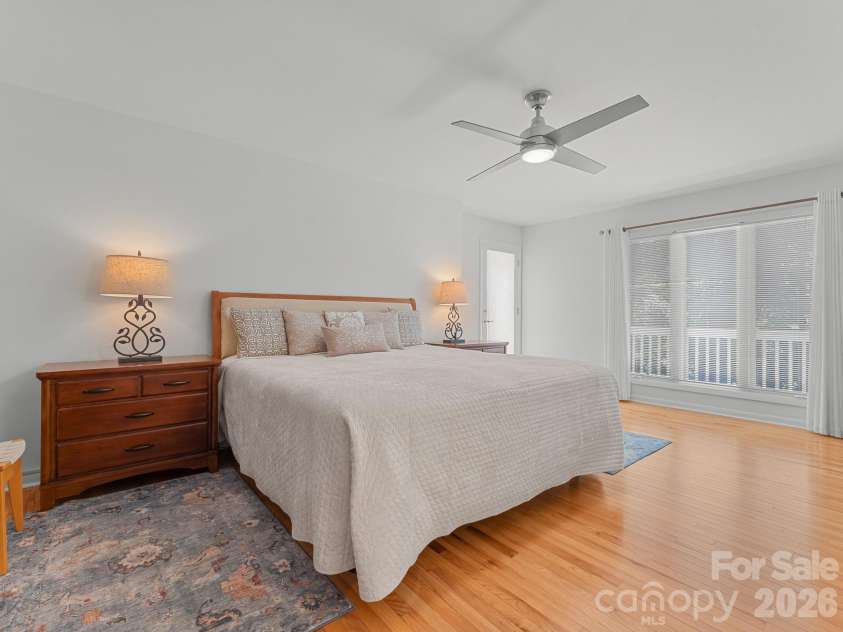 5 Jackson Grove, Landrum, SC 29356.  MLS# CAR4416972, YatesRealty ID 46122. Primary Bedroom with door leading to the deck