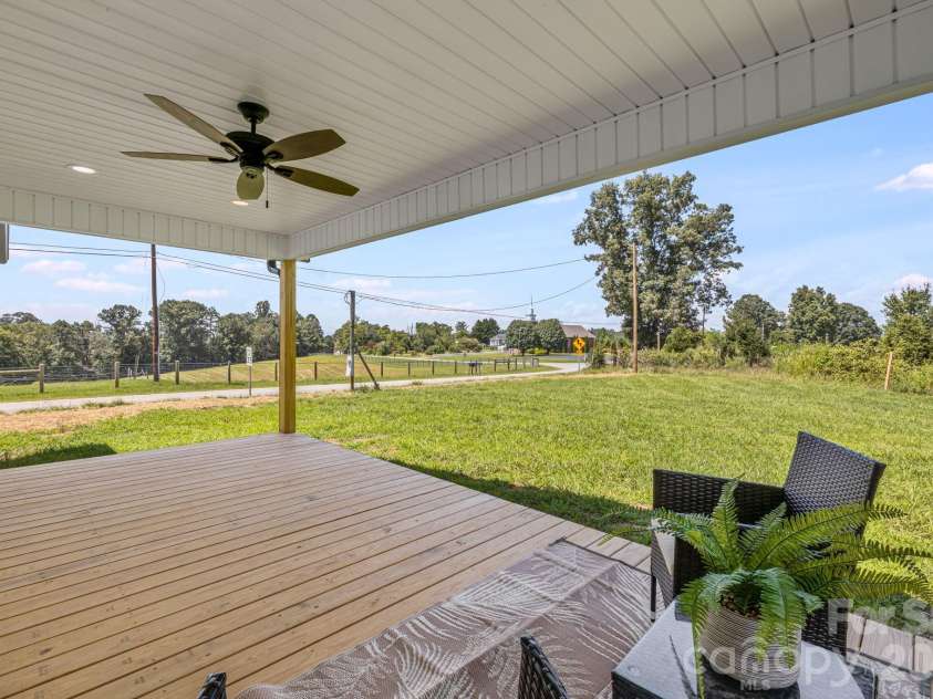735 Jupiter Road, Weaverville, NC 28787.  MLS# CAR4410914, YatesRealty ID 46131. Covered Back Deck