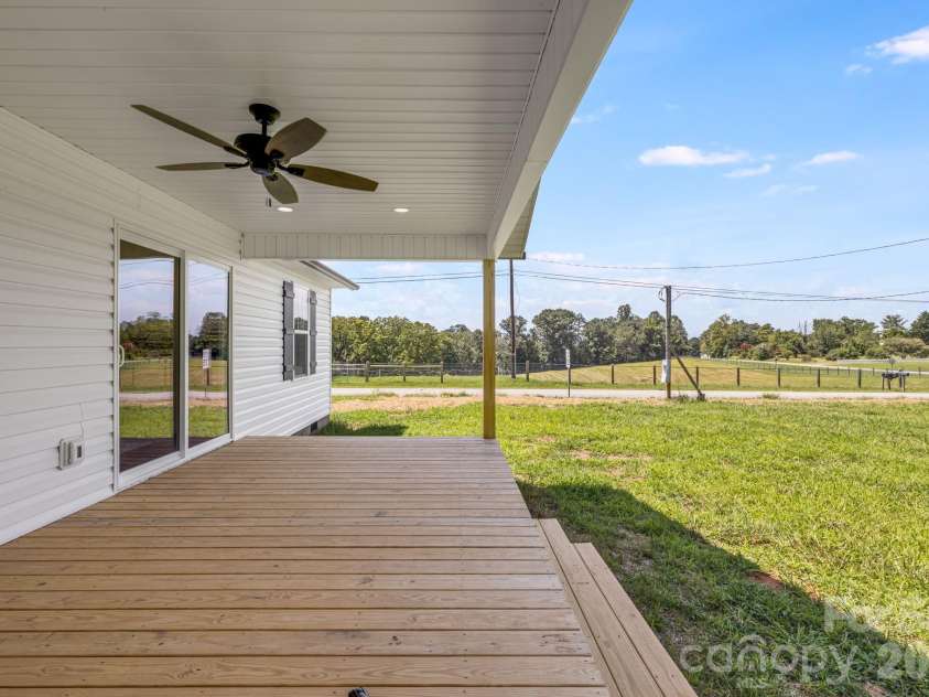 735 Jupiter Road, Weaverville, NC 28787.  MLS# CAR4410914, YatesRealty ID 46131. Covered Back Deck