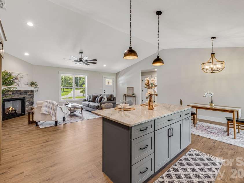 735 Jupiter Road, Weaverville, NC 28787.  MLS# CAR4410914, YatesRealty ID 46131. Kitchen looking toward Living Room