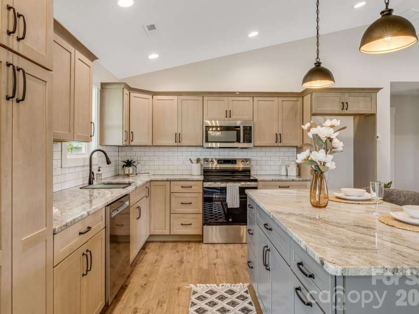 735 Jupiter Road, Weaverville, NC 28787.  MLS# CAR4410914, YatesRealty ID 46131. Modern, spacious kitchen