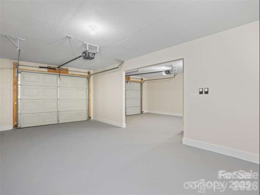 11 Tahchee Trail, Fletcher, NC 28732.  MLS# CAR4415640, YatesRealty ID 46135. Oversized 2 Car Garage!