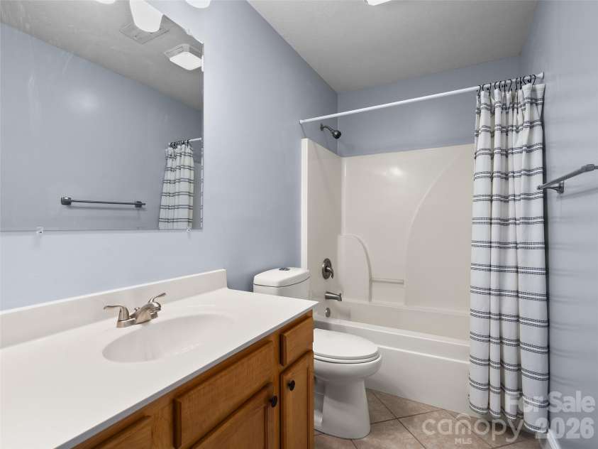 11 Tahchee Trail, Fletcher, NC 28732.  MLS# CAR4415640, YatesRealty ID 46135. Shared Full Bath with Shower/ Tub on Main Floor