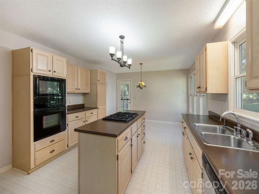 15 Glen Crest Drive, Arden, NC 28704.  MLS# CAR4416673, YatesRealty ID 46138. Another View of the Kitchen
