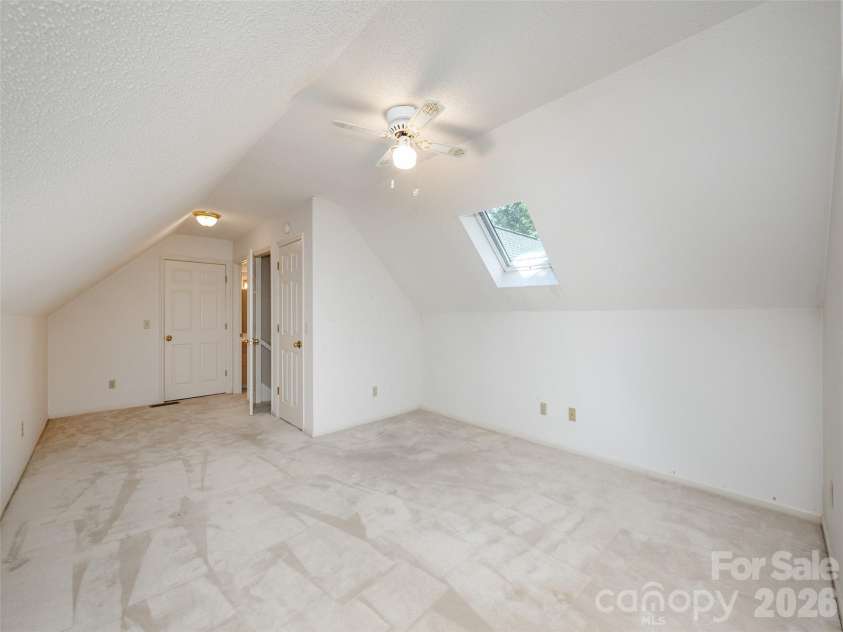 15 Glen Crest Drive, Arden, NC 28704.  MLS# CAR4416673, YatesRealty ID 46138. Bonus Room looking toward Adjacent Bath