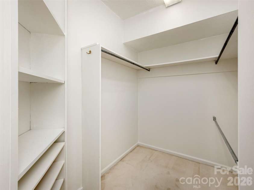 15 Glen Crest Drive, Arden, NC 28704.  MLS# CAR4416673, YatesRealty ID 46138. Inside the Primary Closet