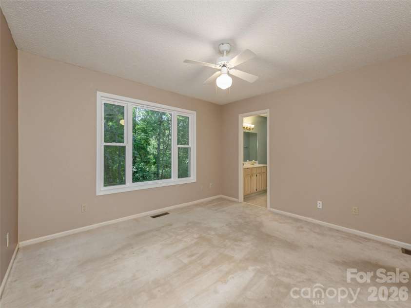 15 Glen Crest Drive, Arden, NC 28704.  MLS# CAR4416673, YatesRealty ID 46138. Primary Bedroom Main Level