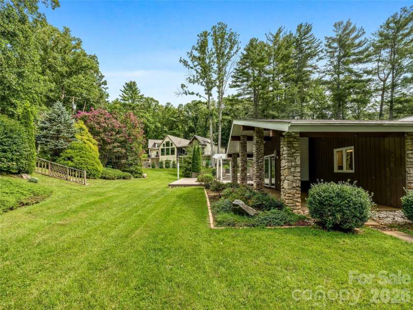 175 Robinhood Road, Asheville, NC 28804.  MLS# CAR4416843, YatesRealty ID 46146. Level backyard