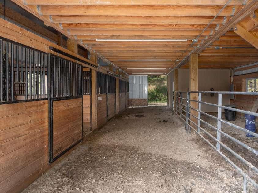 135 Potato Branch Road, Leicester, NC 28748.  MLS# CAR4415427, YatesRealty ID 46150. Barn Interior