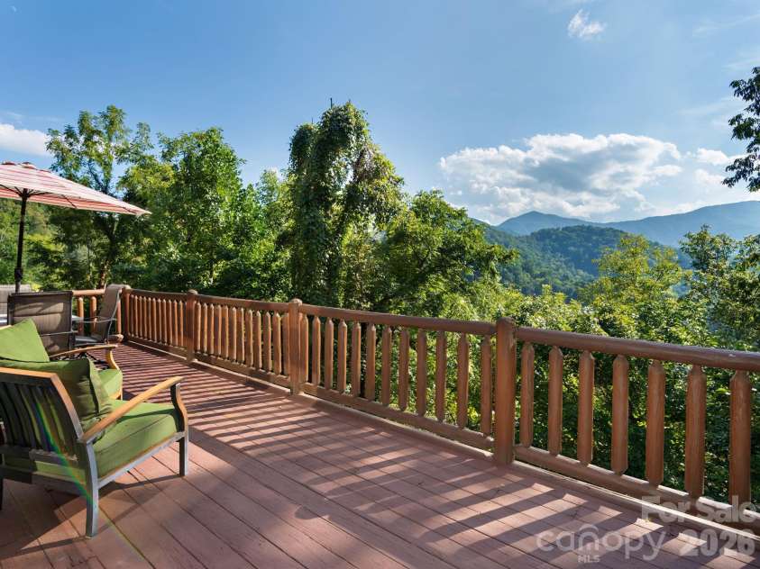 135 Potato Branch Road, Leicester, NC 28748.  MLS# CAR4415427, YatesRealty ID 46150. Honeymoon Cabin Deck View