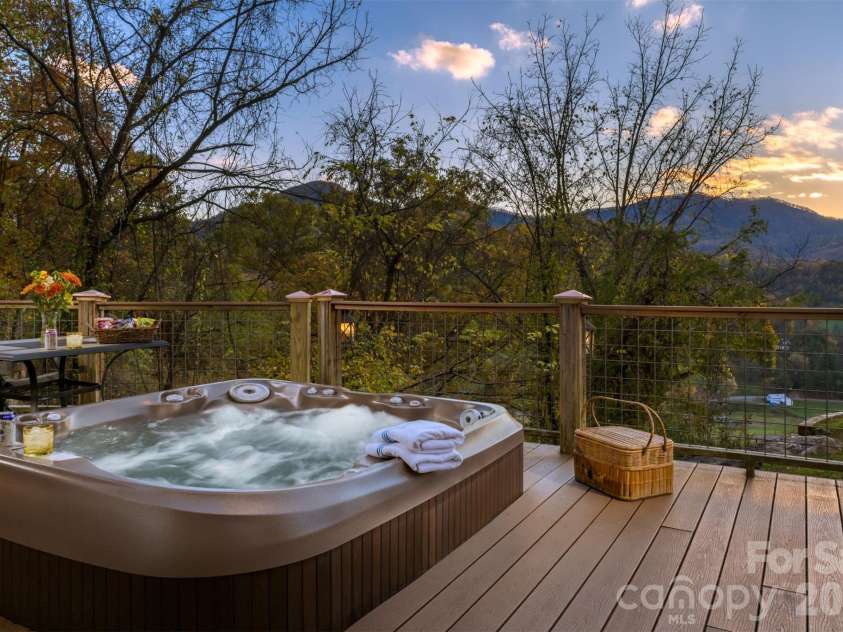 135 Potato Branch Road, Leicester, NC 28748.  MLS# CAR4415427, YatesRealty ID 46150. Hot tub