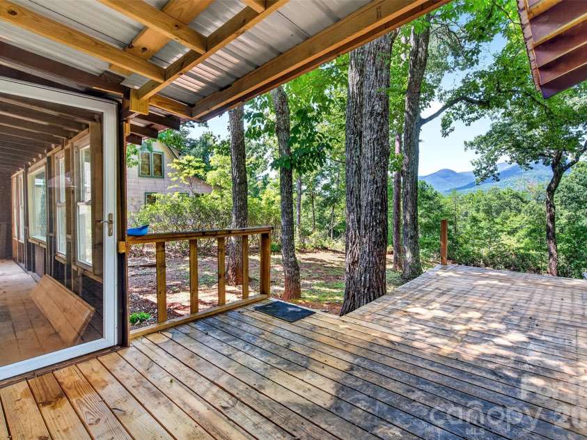 128 Pearson Circle, Lake Lure, NC 28746.  MLS# CAR4417256, YatesRealty ID 46151. Additional enclosed porch