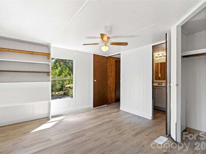 128 Pearson Circle, Lake Lure, NC 28746.  MLS# CAR4417256, YatesRealty ID 46151. Guest bed