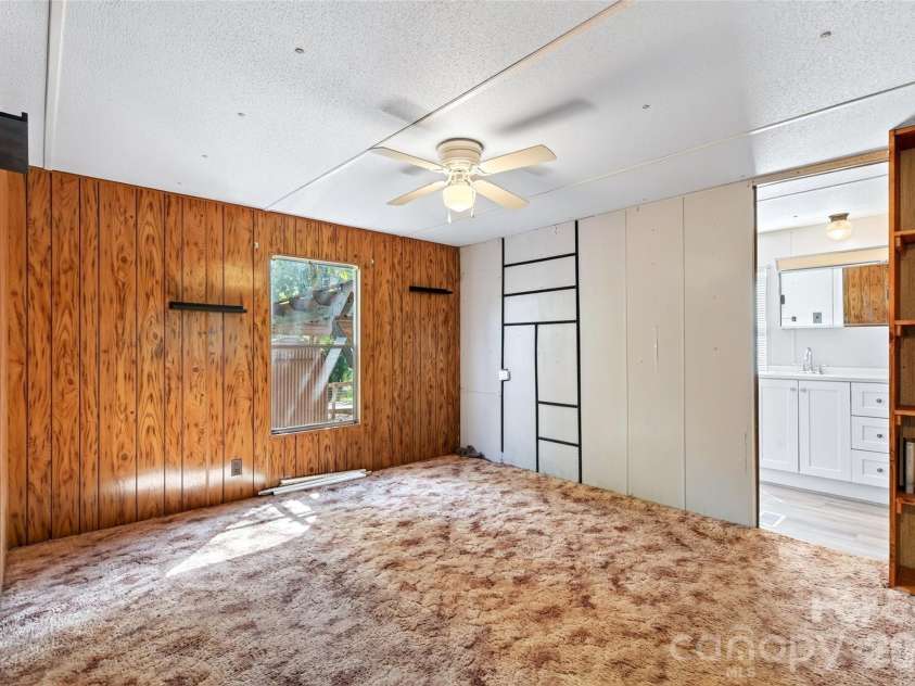128 Pearson Circle, Lake Lure, NC 28746.  MLS# CAR4417256, YatesRealty ID 46151. Primary Suite