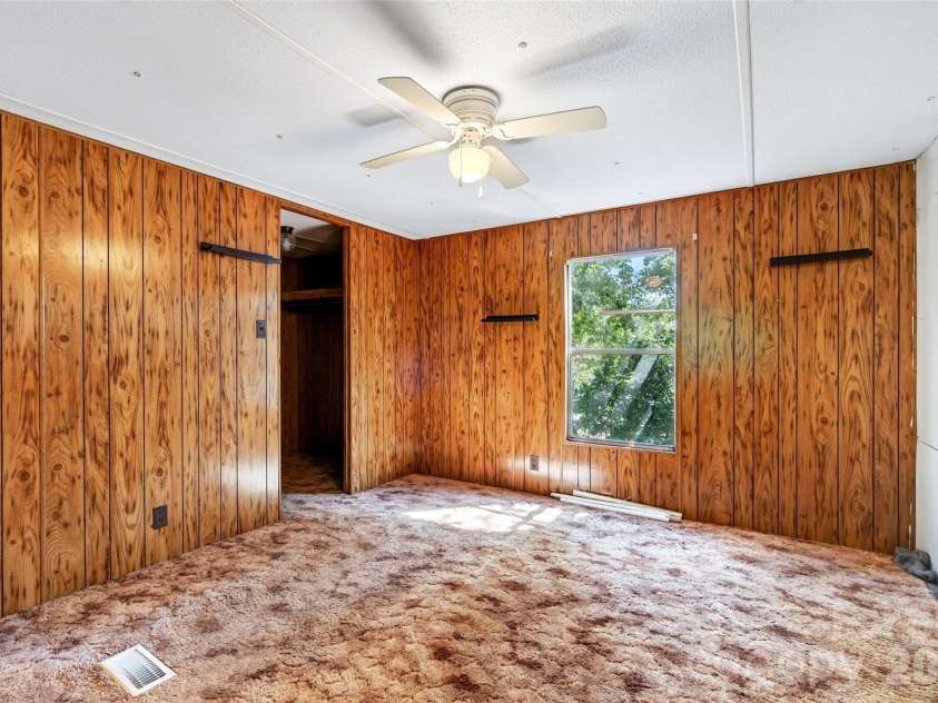 128 Pearson Circle, Lake Lure, NC 28746.  MLS# CAR4417256, YatesRealty ID 46151. Primary Suite