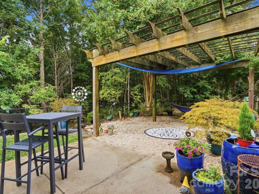 282 Kendra Drive, Concord, NC 28025.  MLS# CAR4414096, YatesRealty ID 46159. Backyard tranquility!