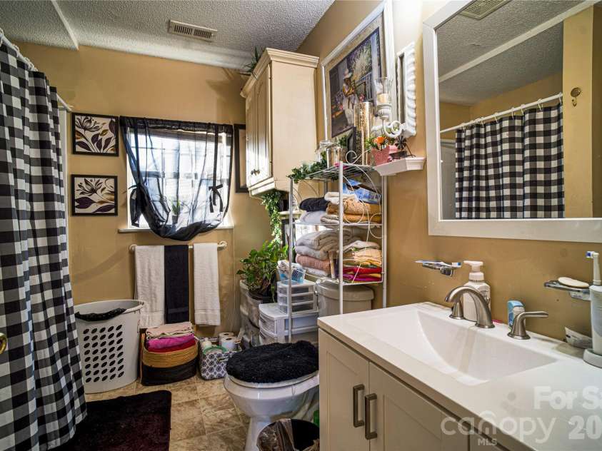 1595 Long Street, Salisbury, NC 28144.  MLS# CAR4414820, YatesRealty ID 46174. Unit A Bathroom