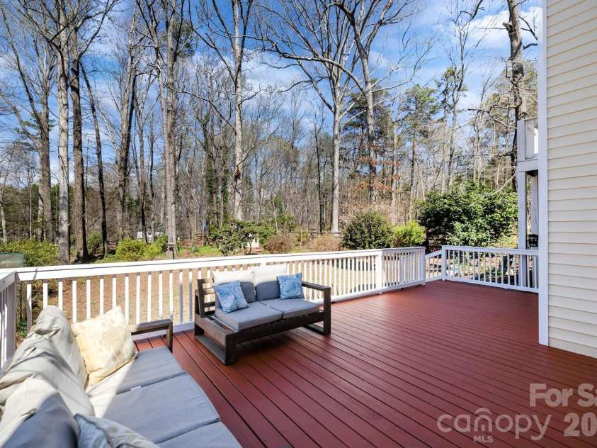 13702 Chambray Lane, Charlotte, NC 28278.  MLS# CAR4356054, YatesRealty ID 46177. Deck to Oasis Backyard