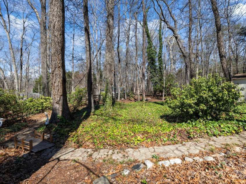 13702 Chambray Lane, Charlotte, NC 28278.  MLS# CAR4356054, YatesRealty ID 46177. Walking steps to cute bridge