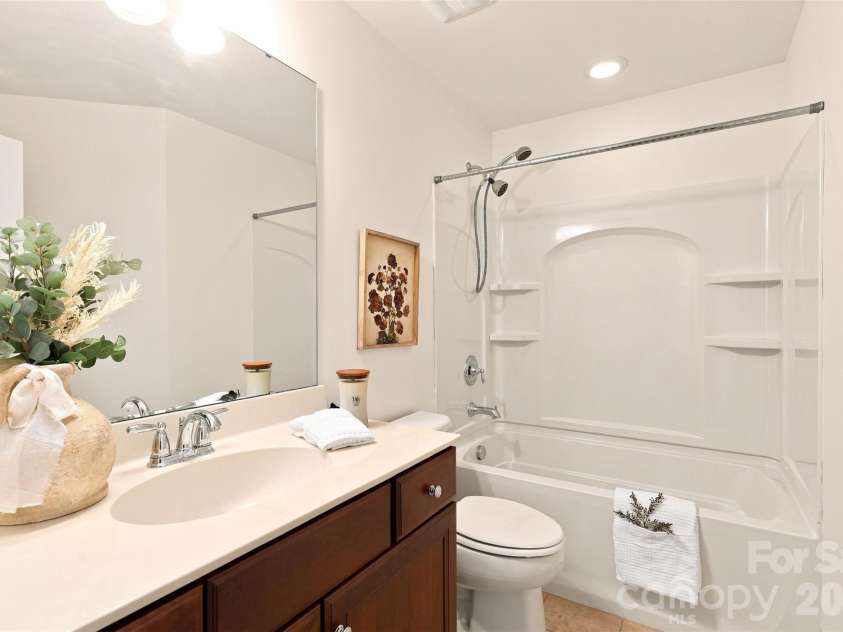 10345 Scotland Avenue, Indian Land, SC 29707.  MLS# CAR4416567, YatesRealty ID 46181. Shared full bath serves both secondary bedrooms and features a spacious vanity plus a tub-and-shower combination