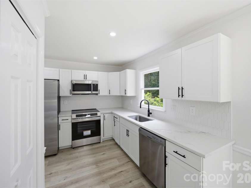 7241 Mcteal Place, Charlotte, NC 28262.  MLS# CAR4416616, YatesRealty ID 46187. 