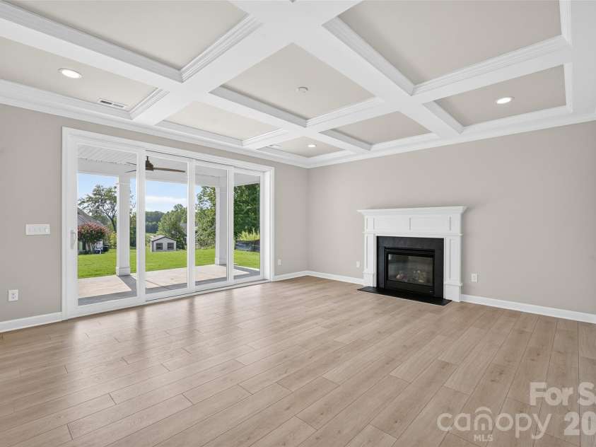 110 Elora Lane, Mooresville, NC 28115.  MLS# CAR4417104, YatesRealty ID 46191. Great room with coffered ceiling.