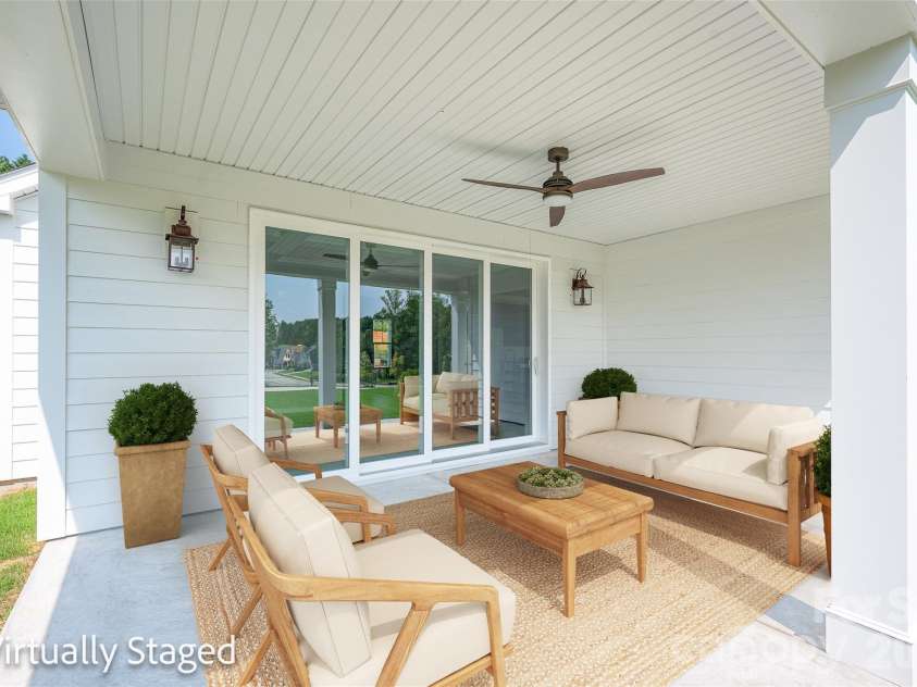 110 Elora Lane, Mooresville, NC 28115.  MLS# CAR4417104, YatesRealty ID 46191. Staged covered back patio.