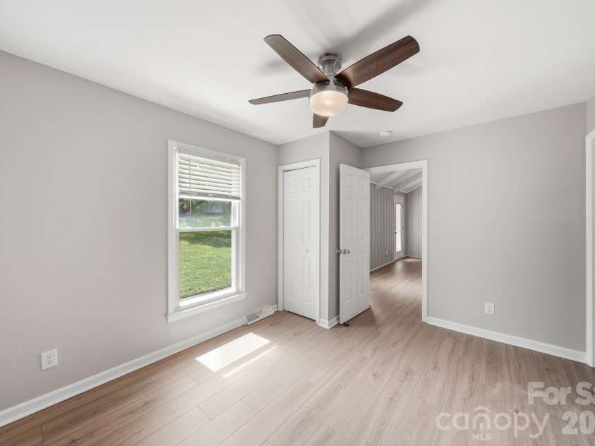 4710 Carving Tree Drive, Charlotte, NC 28227.  MLS# CAR4416653, YatesRealty ID 46194. 4th bedroom off the kitchen and living area that could also function as a flex room: could be a formal dining room, office, or anything else you like!