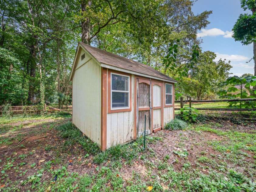 4710 Carving Tree Drive, Charlotte, NC 28227.  MLS# CAR4416653, YatesRealty ID 46194. Shed for all your tools and hobbies!