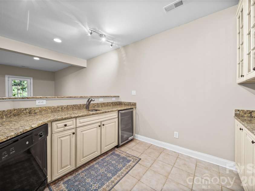 2246 Donnington Lane, Concord, NC 28027.  MLS# CAR4415770, YatesRealty ID 46197. Basement kitchenette
