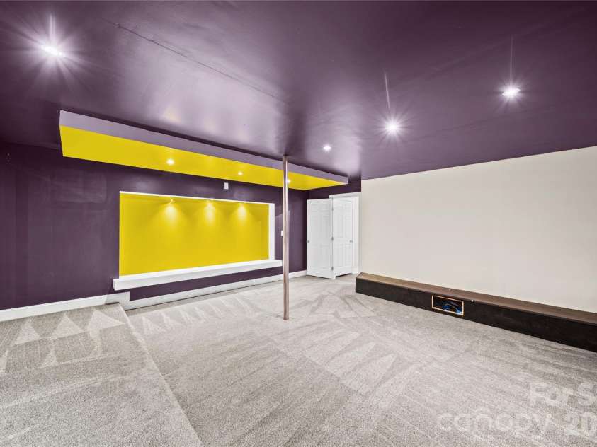 2246 Donnington Lane, Concord, NC 28027.  MLS# CAR4415770, YatesRealty ID 46197. Basement media room
