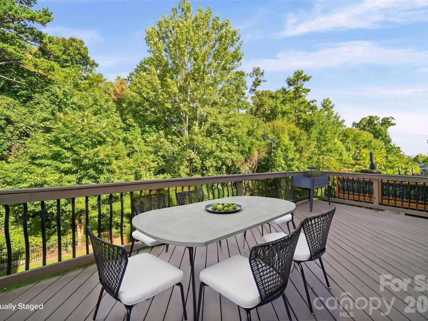 2246 Donnington Lane, Concord, NC 28027.  MLS# CAR4415770, YatesRealty ID 46197. Patio facing wooded backyard