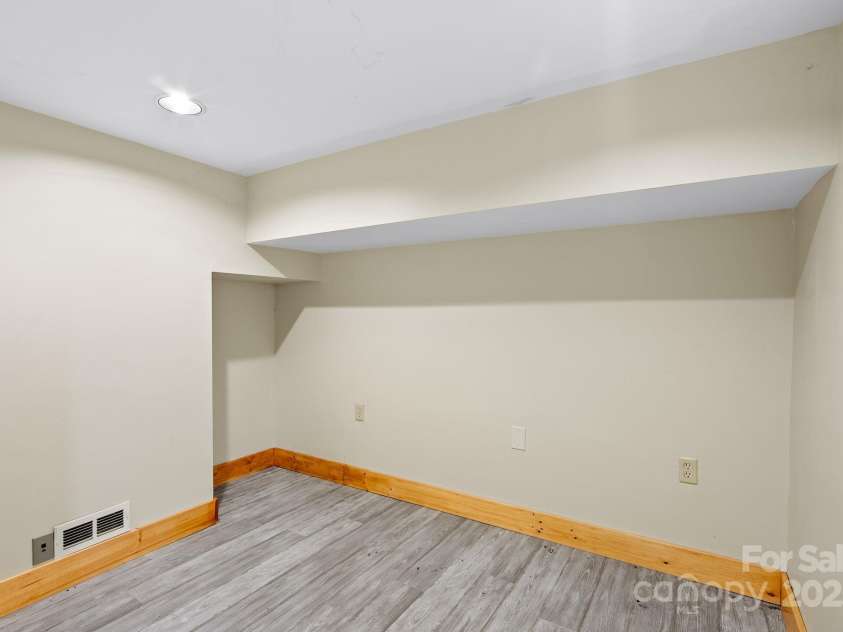 511 Gilreath Loop, Mills River, NC 28759.  MLS# CAR4218219, YatesRealty ID 4620. Basement storage room