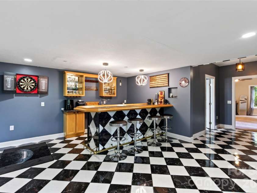 719 April Park, Waynesville, NC 28786.  MLS# CAR4414470, YatesRealty ID 46204. Lower Level Bar Area