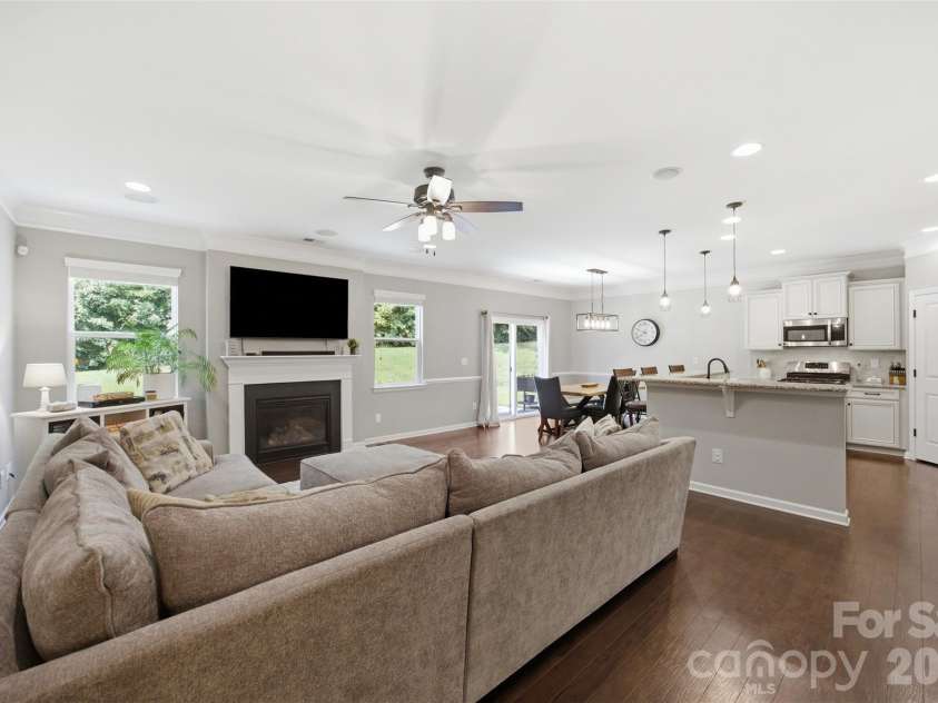 1335 Soothing Court, Concord, NC 28027.  MLS# CAR4414571, YatesRealty ID 46205. Living room and Kitchen