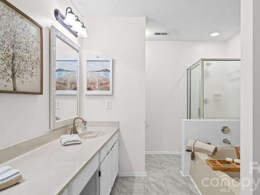235 Withershinn Drive, Charlotte, NC 28262.  MLS# CAR4414548, YatesRealty ID 46207. Dual vanities